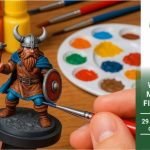 Ręka maluje figurkę wikinga